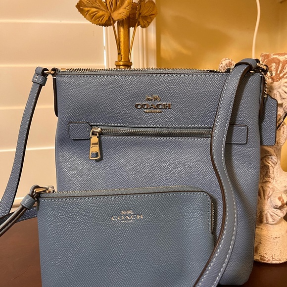 Coach Handbags - Coach Blue Crossbody Bag with Gold Accents
